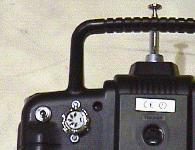 The buddy box connector and switch on the back of the radio transmitter