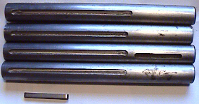 Four axles with keyways milled into them for the hub and sproket units